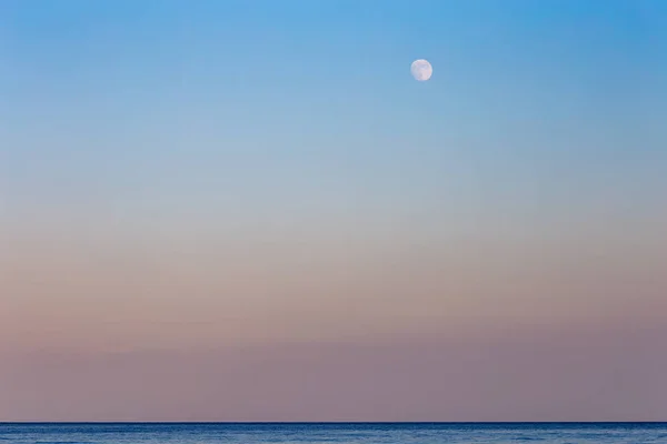 Puesta de sol y luna — Foto de Stock