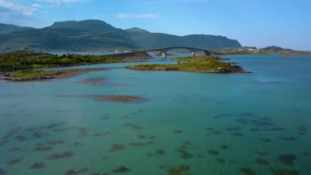 Aerial view of scenic road on Lofoten islands in Norway with bridge connecting islands — ストック動画