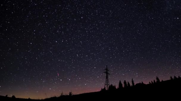 El movimiento de las estrellas en el cielo nocturno — Vídeos de Stock