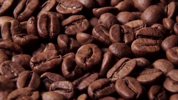 Rotating shot of delicious roasted coffee beans — Stock Video