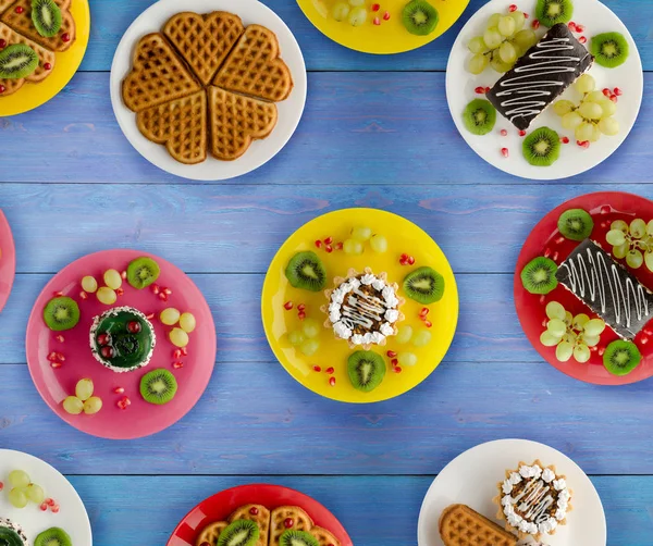 stock image cakes, cookies waffles on the table. dessert for a festive table. sweets view from above