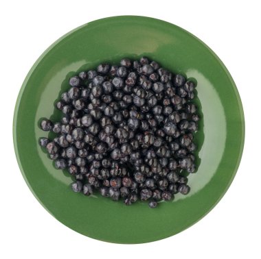 Beyaz arka plan üzerinde izole bir plaka üzerinde yaban mersini. yaban mersini türüne. sağlıklı gıda