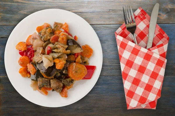 vegetable stew on a wooden background. stew in Bulgarian