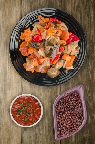 vegetable stew on a wooden background. stew in Bulgarian