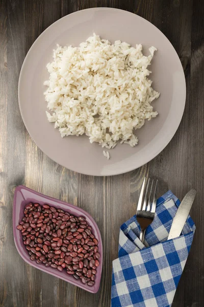 white rice on a plate. rice on a wooden background top view .Asian healthy food