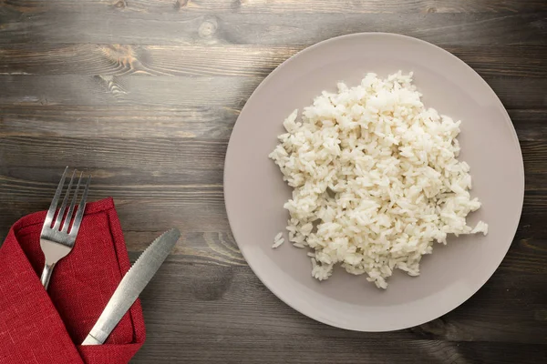 white rice on a plate. rice on a wooden background top view .Asian healthy food