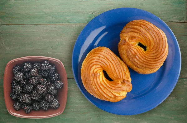 custard cake on a plate. custard  cake on a wooden background. cake top view