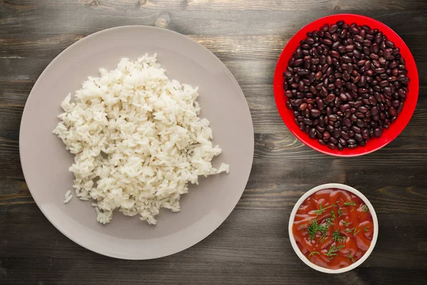 white rice on a plate. rice on a wooden background top view .Asian healthy food