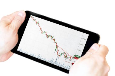 elinde stok grafikleri ile tablet. elinde tablet whi izole