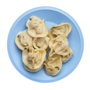 Beyaz arka planda izole bir plaka üzerinde köfte. et Dumpling