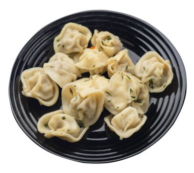 Beyaz arka planda izole bir plaka üzerinde köfte. et Dumpling