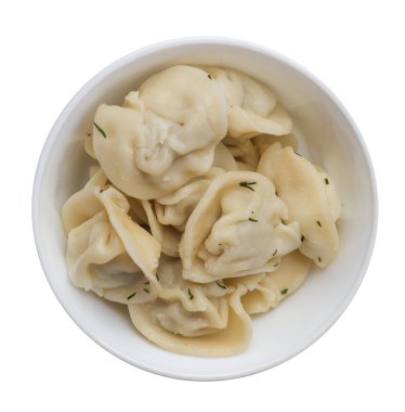 Beyaz arka planda izole bir plaka üzerinde köfte. et Dumpling