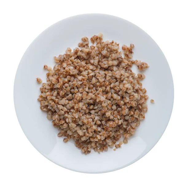 Buckwheat in a plate isolated on white background. buckwheat top — Stock Photo, Image