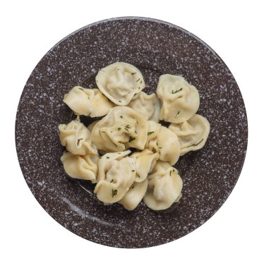 Beyaz arka planda izole bir plaka üzerinde köfte. et Dumpling