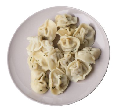 Beyaz arka planda izole bir plaka üzerinde köfte. et Dumpling