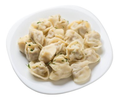 Beyaz arka planda izole bir plaka üzerinde köfte. et Dumpling