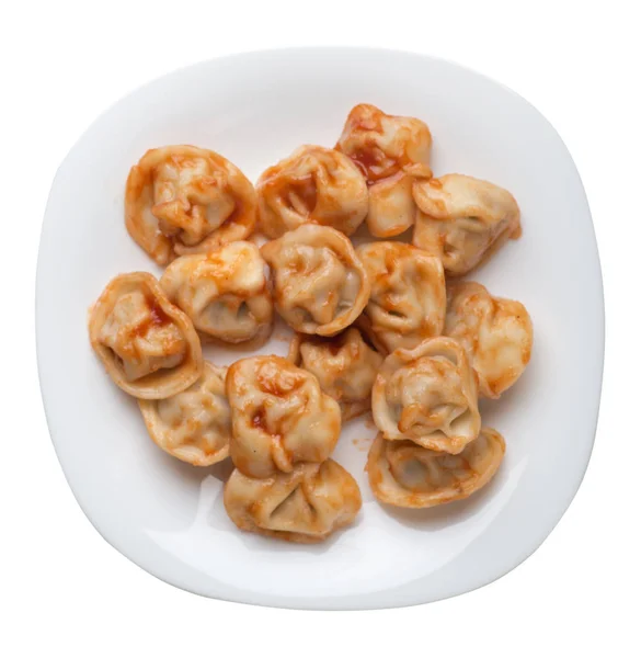 Dumplings på en tallrik isolerad på vit bakgrund. dumplings i — Stockfoto