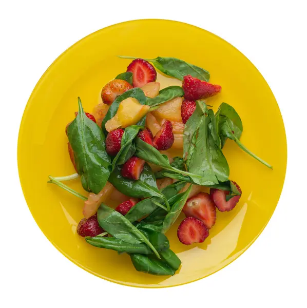 Salada com morangos, abacaxi e espinafre em uma chapa. Frutas — Fotografia de Stock