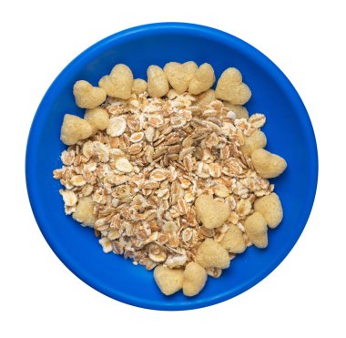  beyaz arka plan.müsli mısır gevreği, kuru üzüm, hurma, armut ve ananas kurutulmuş kaju fıstığı.breakfast üst görünümü ile izole bir tabakta sağlıklı kahvaltı