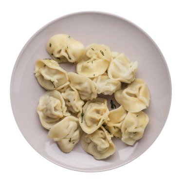 Beyaz arka planda izole bir plaka üzerinde köfte. et Dumpling