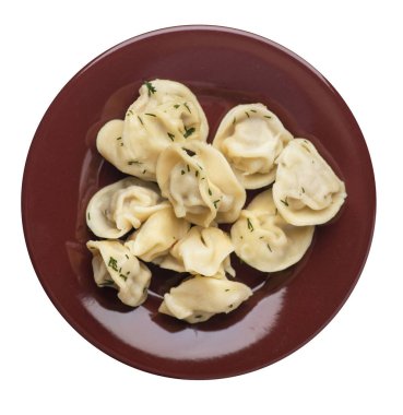 Beyaz arka planda izole bir plaka üzerinde köfte. et Dumpling