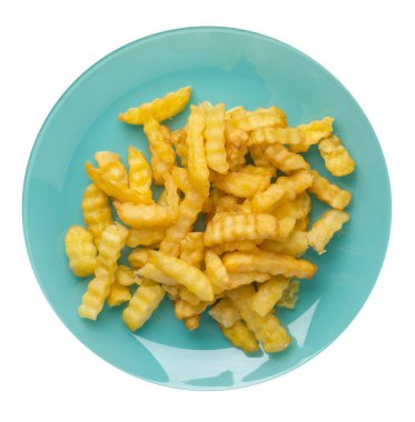 beyaz arka planda izole edilmiş bir tabakta patates kızartması.bir tabak üst görünümünde patates kızartması .abur cubur . 