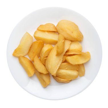 bir plaka üzerinde kızarmış patates takozlar. kızarmış patates sebzeler beyaz arka planda izole. Gıda üst görünümü