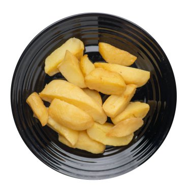 bir plaka üzerinde kızarmış patates takozlar. kızarmış patates sebzeler beyaz arka planda izole. Gıda üst görünümü