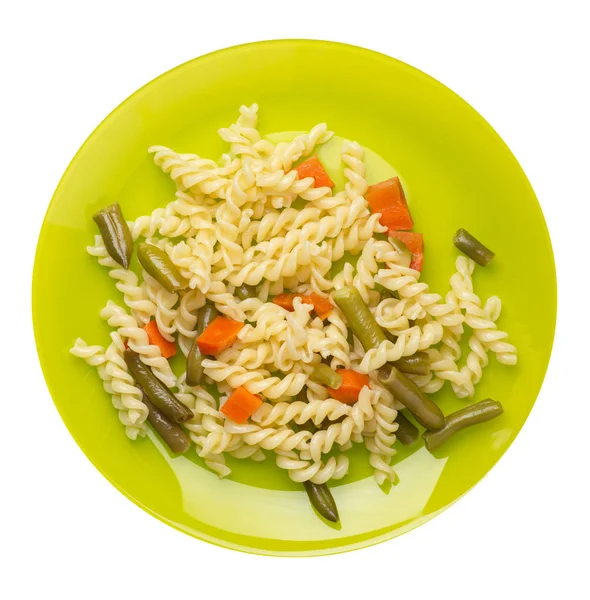 Pasta with green beans with garlicand carrots on a plate isolated on a white background. Mediterranean Kitchen . pasta  top view. — Stock Photo, Image