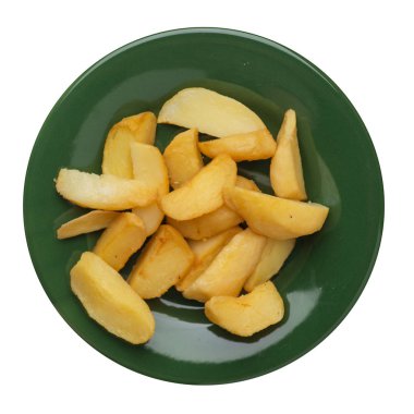 bir plaka üzerinde kızarmış patates takozlar. kızarmış patates sebzeler üzerinde izole