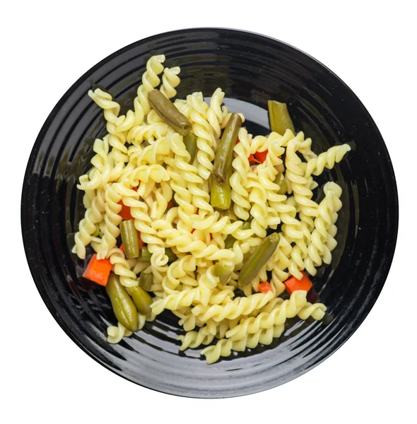 Pasta met groene bonen met garlicand wortelen op een plaat isolaat — Stockfoto