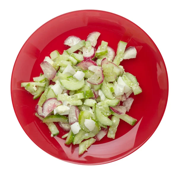 Salátával, uborkát és tojást egy tányérra izolált fehér backg — Stock Fotó