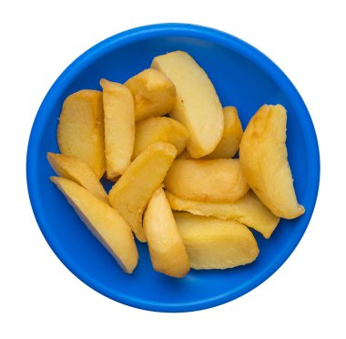 bir plaka üzerinde kızarmış patates takozlar. kızarmış patates sebzeler üzerinde izole