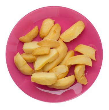 bir plaka üzerinde kızarmış patates takozlar. kızarmış patates sebzeler beyaz arka planda izole. Gıda üst görünümü