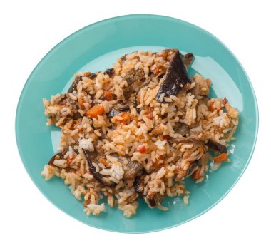 bir tabakta domates ve biber ile kızarmış kabak ile pirinç.