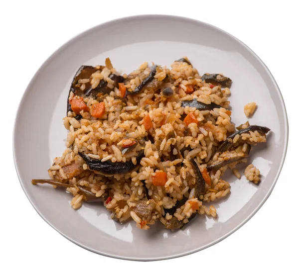 Rice with braised zucchini with tomatoes and peppers on a plate. — Stock Photo, Image