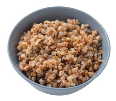 beyaz arka plan üzerinde izole bir tabakta karabuğday. karabuğday üst görünümü.