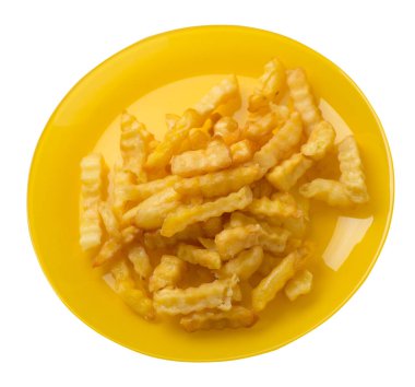 beyaz arka planda izole edilmiş bir tabakta patates kızartması.bir tabak üst görünümünde patates kızartması .abur cubur .