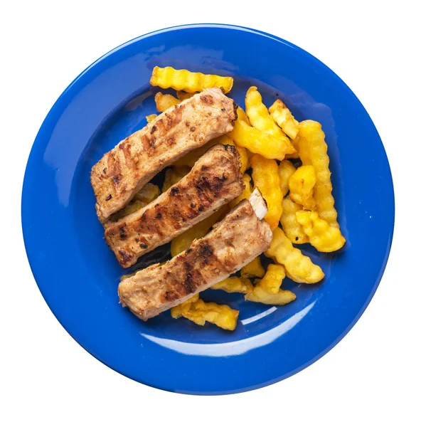 grilled pork ribs with french fries on a plate. pork ribs with french fries on white background. ribs with potatoes top view