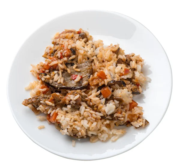 Rice with braised zucchini with tomatoes and peppers on a plate. rice with vegetables isolated on white background. vegetarian food. Asian cuisine top view — Stock Photo, Image