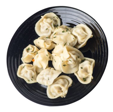 Beyaz arka planda izole bir plaka üzerinde köfte. et Dumpling