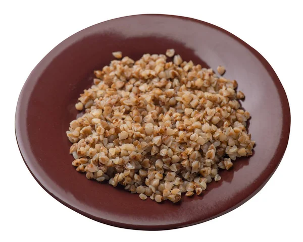 Beyaz arka planda izole bir plaka karabuğday. Karabuğday üst