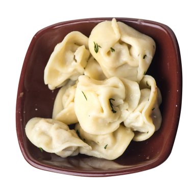 Beyaz arka planda izole bir plaka üzerinde köfte. et Dumpling