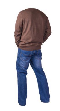 Beyaz arka planda izole edilmiş erkek kazağı ve mavi kot pantolon. Günlük kıyafetler.