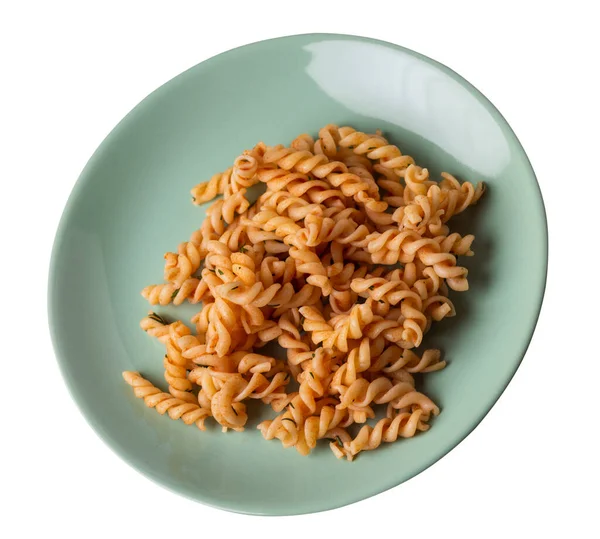 浅绿色盘子上的意大利面 白色背景隔离 番茄酱中的意大利面配上丁香 意大利面顶面视图 — 图库照片