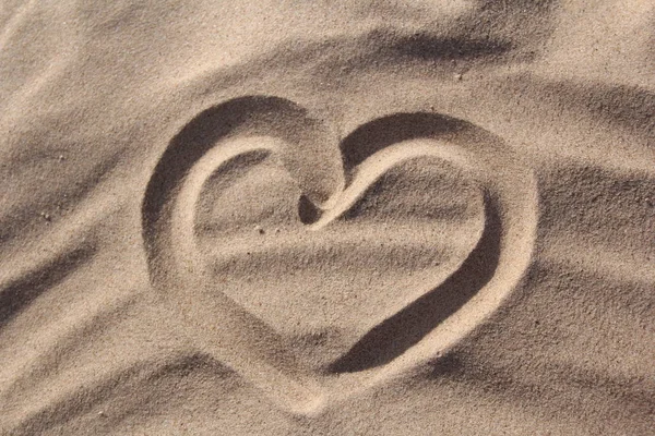 pure heart in hot sand