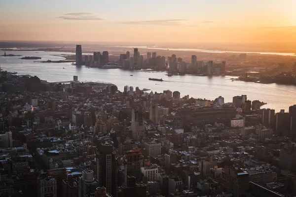 Aerial sunset over Manhattan from a high point of view