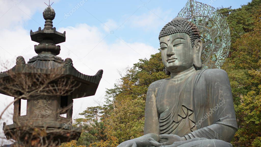 108 ton gilt-bronze Buddha statue called 