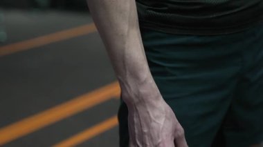 Muscular man with strong arm muscle and vein. Strong sportsman relax in gym. Sport athlete man has muscular arm. Strong and muscular sportsman. Sport lifestyle. Biceps triceps muscle, 4k.