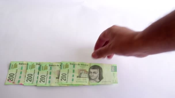 Banyak Tagihan Peso Mexican 200 Diakomodasi Oleh Tangan Take — Stok Video